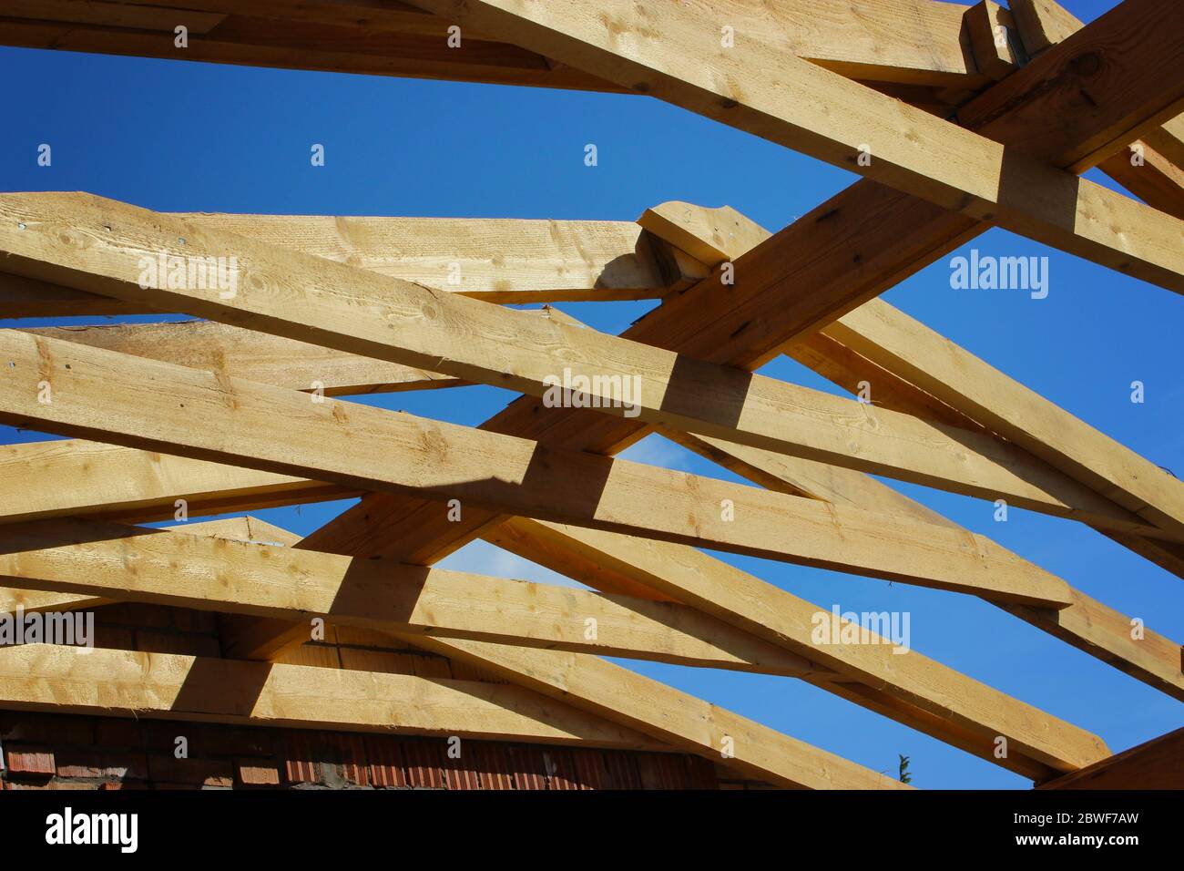 Roof trusses not covered with ceramic tile on detached house under ...