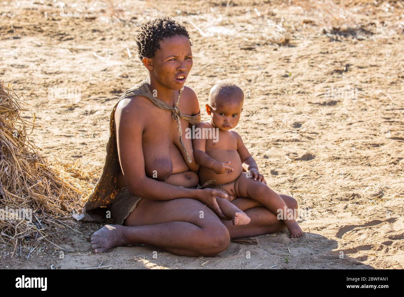 Bushman, Kalahari Desert, Namibia. The Bushmen are indigenous people of southern Africa that span areas of South Africa, Zimbabwe, Lesotho, Mozambique Stock Photo