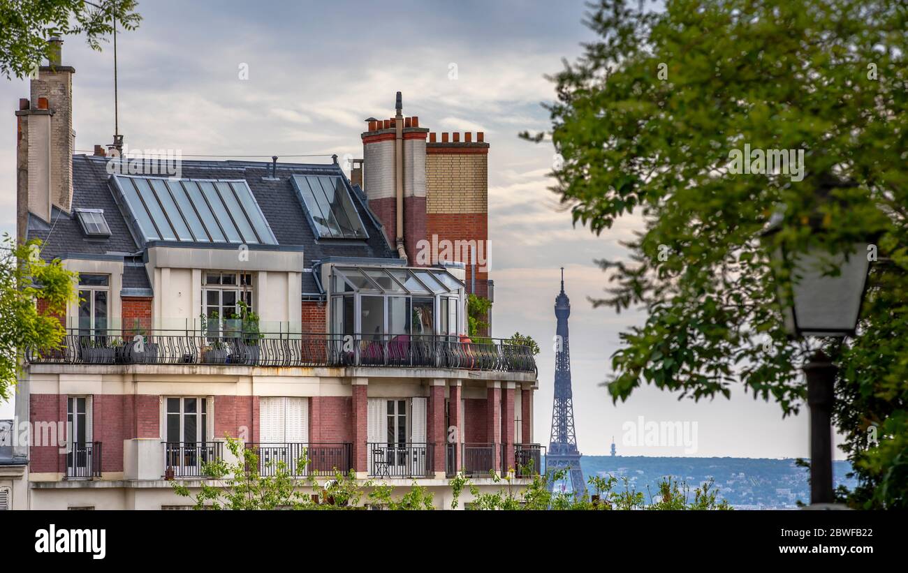 Paris, France - May 12, 2020: Buildings and roofs in the summit of Montmartre hill in Paris Stock Photo