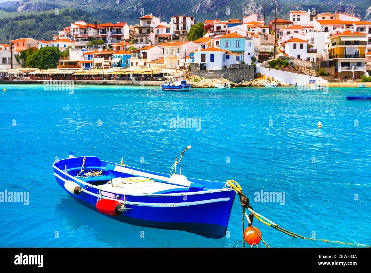 Traditional greek fishing villages. Beautiful Kokkari in Samos island. Popular tourist destination. Stock Photo
