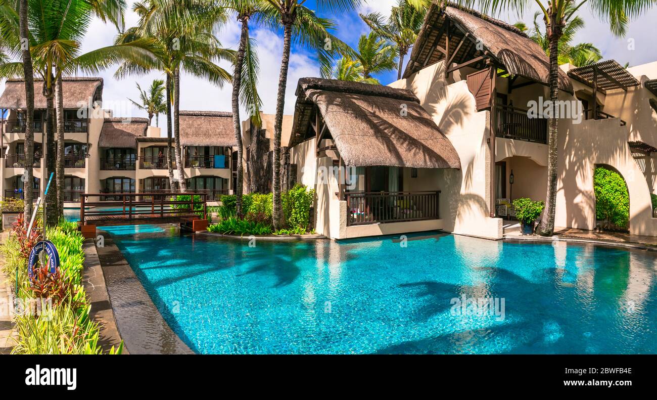 luxury 5 star resort territory with swimming pool and hotel rooms and villas - Constance Belle Mare Plage. Mauritius island. Pointe de flacq , Belle M Stock Photo
