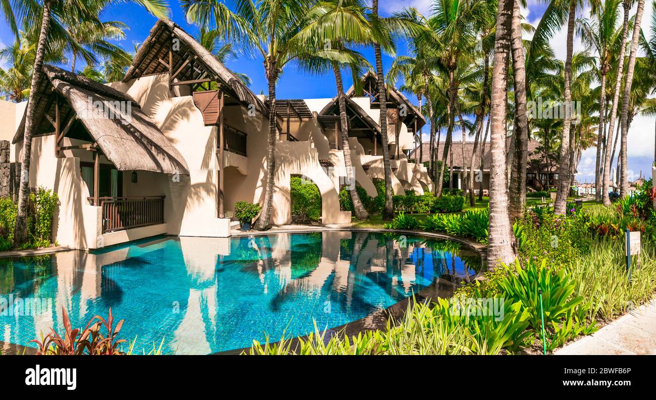 luxury 5 star resort territory with swimming pool and hotel rooms - Constance Belle Mare Plage. Mauritius island. Pointe de flacq , Belle Mare. Februa Stock Photo