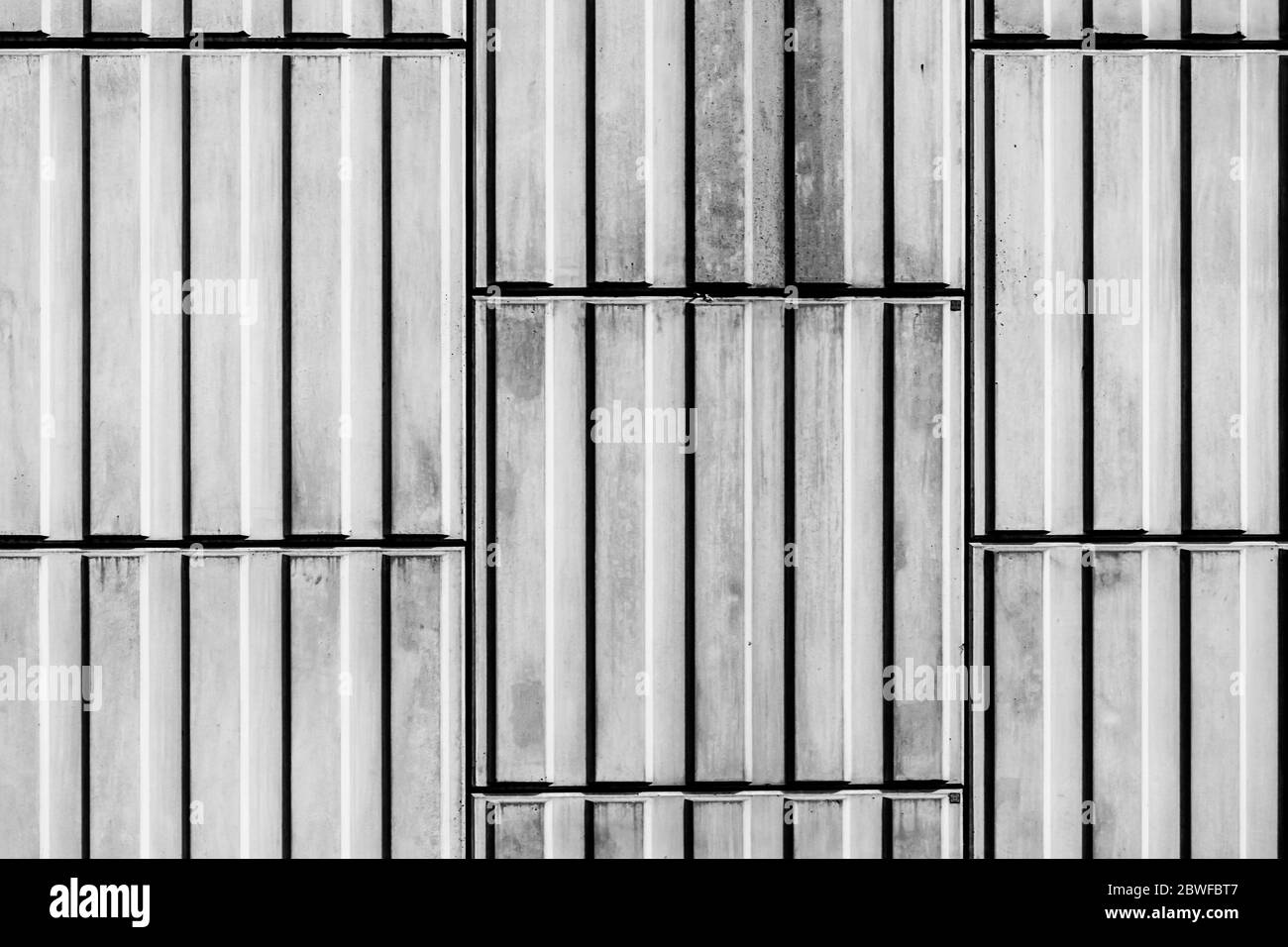 Concrete square blocks background with straight lines and shadows in
