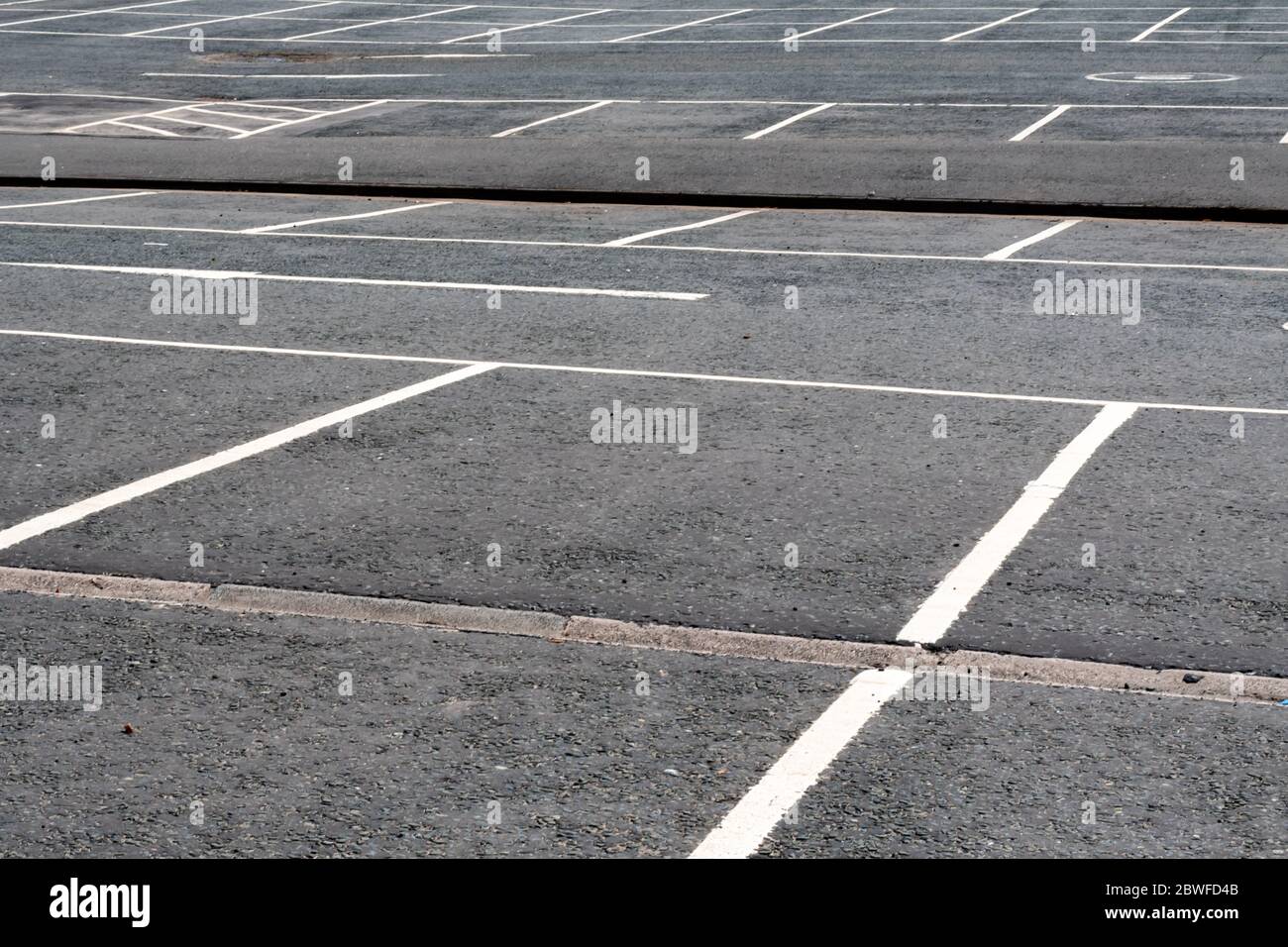 An large empty car park with no vehicles near the city centre of Glasgow, Scotland Stock Photo