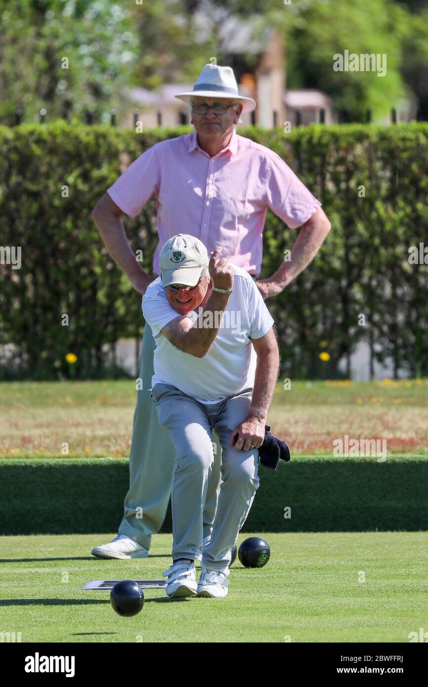 Troon, UK. 01st June, 2020. Troon Bowling Club, one of the oldest bowling clubs in Scotland, opened after the Covid 19 lockdown regulations were loosened, began this years season with singles'games between some of the club's past presidents. The club closed on 19th September 2019, at the end of the bowling season and it was expected to open mid-March 2020 as normal, but the pandemic lock down has made this the longest closure in the club's history .as far as anyone could remember. Credit: Findlay/Alamy Live News Stock Photo