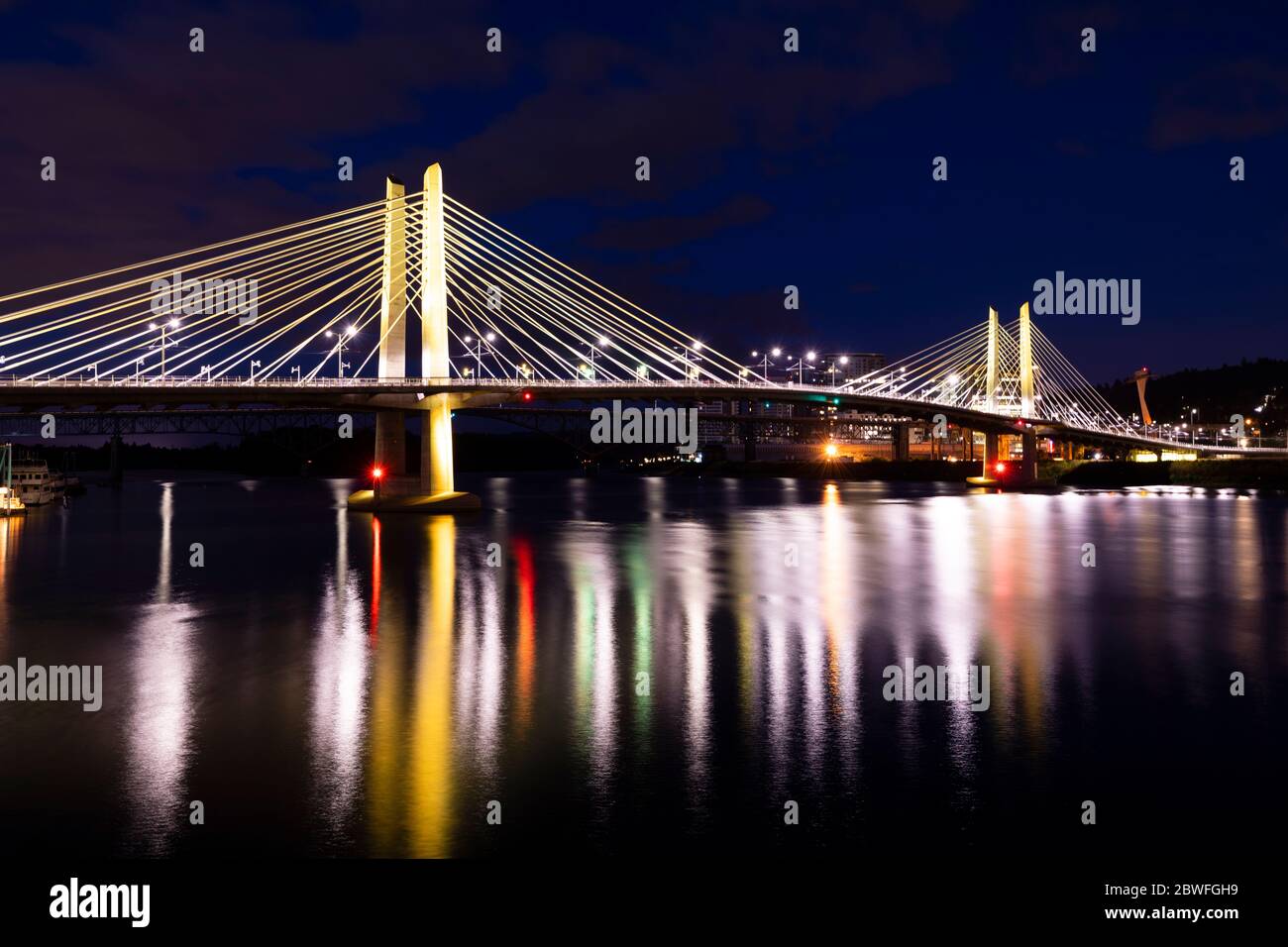 Tilikum Crossing bridge illuminated at night, Portland, Oregon, USA ...