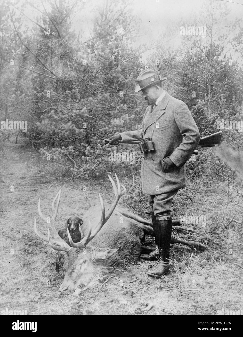 A Royal Stag King of Romania who is enjoying a few weeks hunting in Carpathians in Romania 30 November 1922 Stock Photo