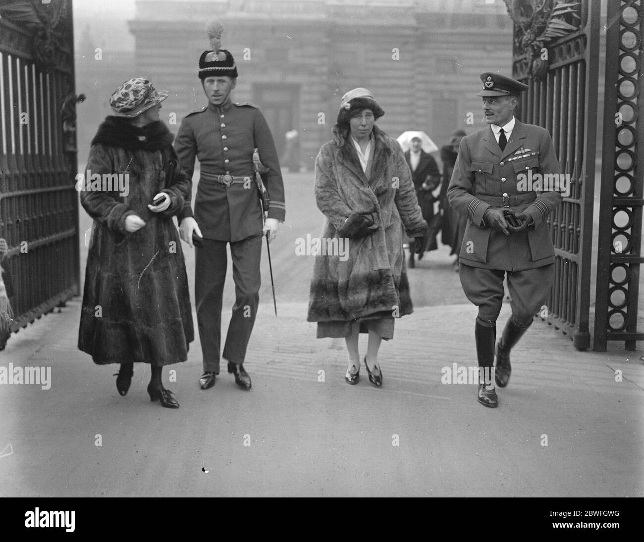 Investiture at Buckingham Palace London Flight Lieutenant Stephens and Wing Commander Strange ( in full dress and service dress of the RAF ) 9 February 1922 Stock Photo