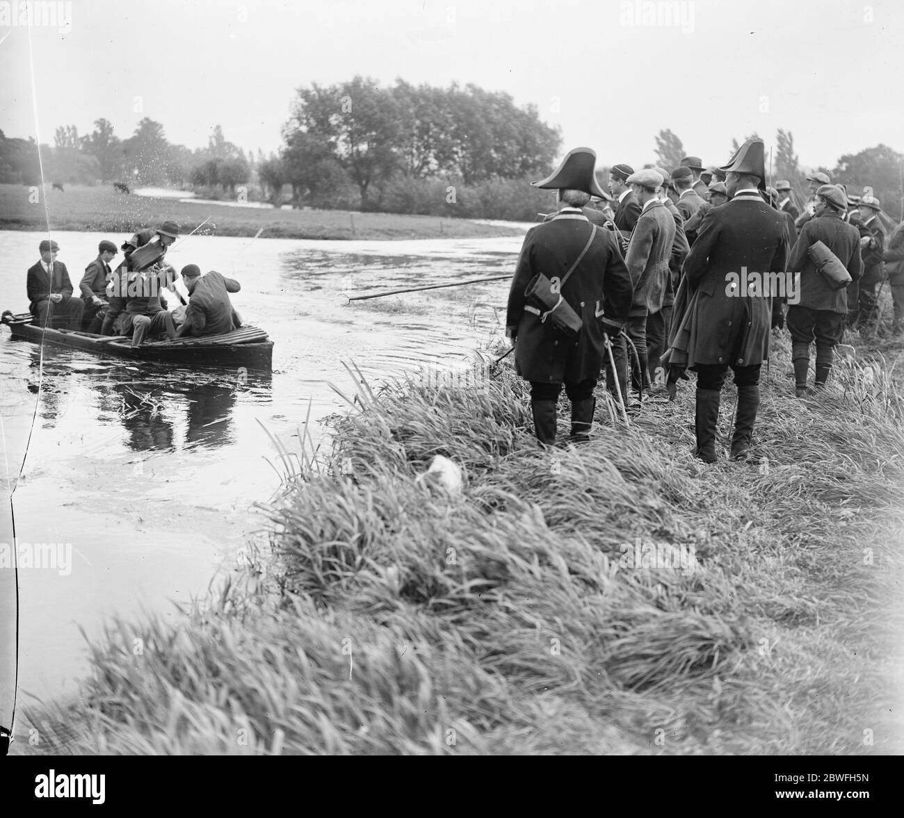 Bumping the Bounds at Canterbury The beaters crossing the river in a