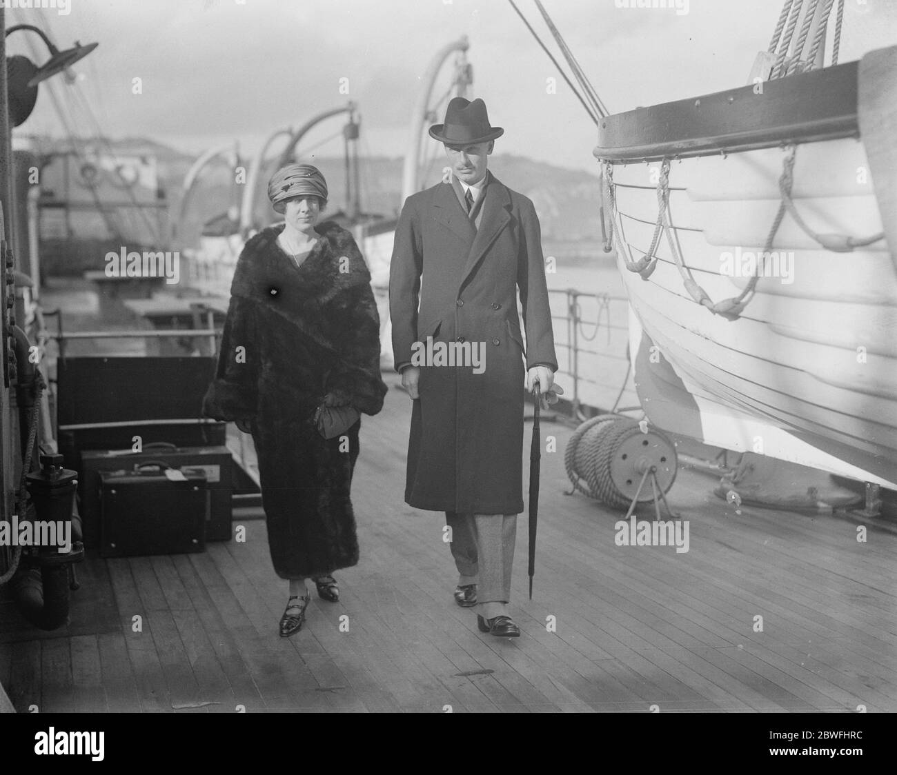 Royal bride ' s honeymoon Lord Carnegie and his bride ( Princess Maud ) who have been spending part of their honeymoon at Hull place , Sheldon , Deal , walking on the deck of the cross channel steamer at Dover , before leaving for the continent , to spend the remainder 17 November 1923 Stock Photo