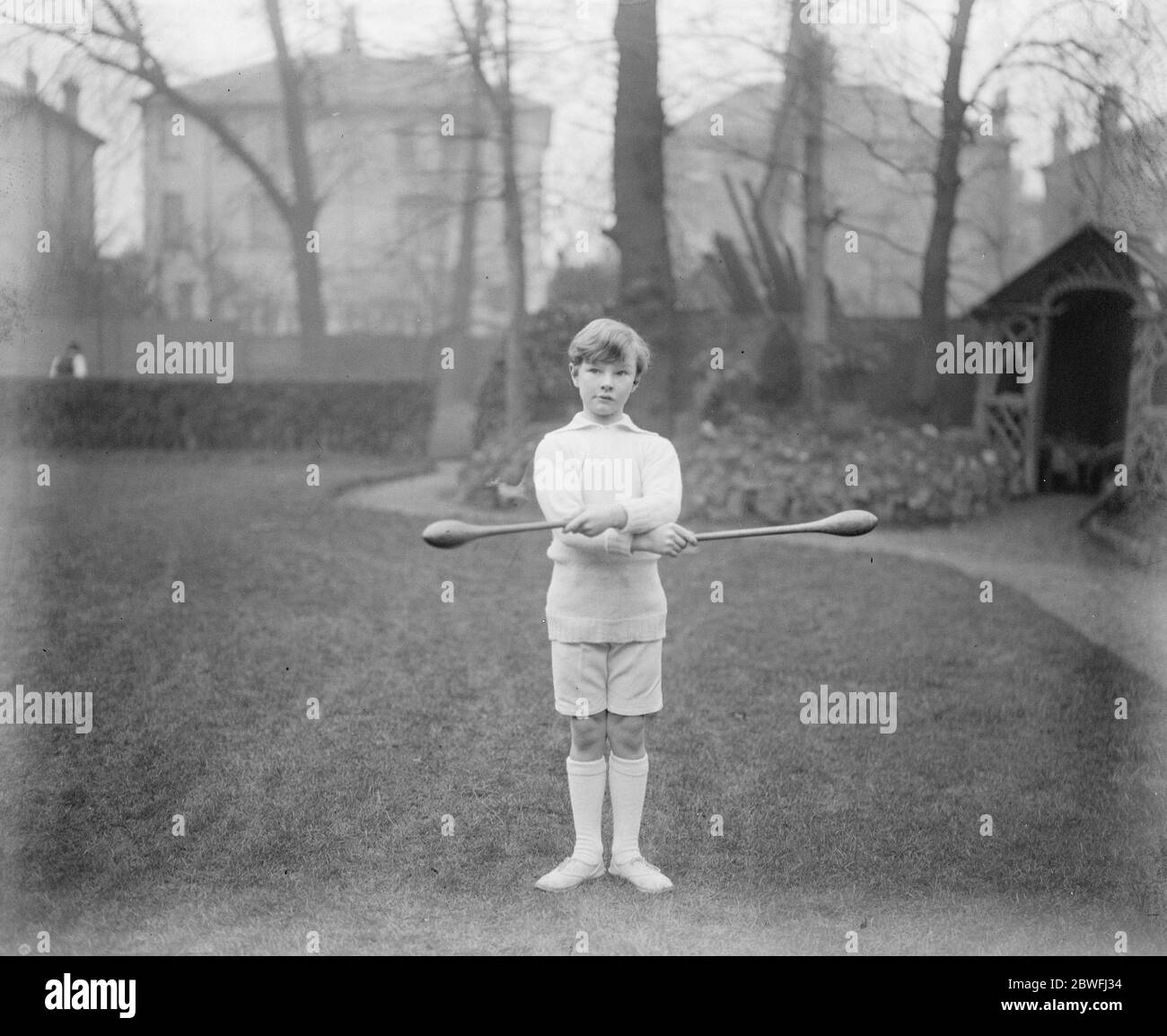 Another boxing Marquess . The young Marquess Townshend is anxious to become a boxer and is already showing considerable promise in the noble art . He is seen here club swinging . 4 February 1924 Stock Photo