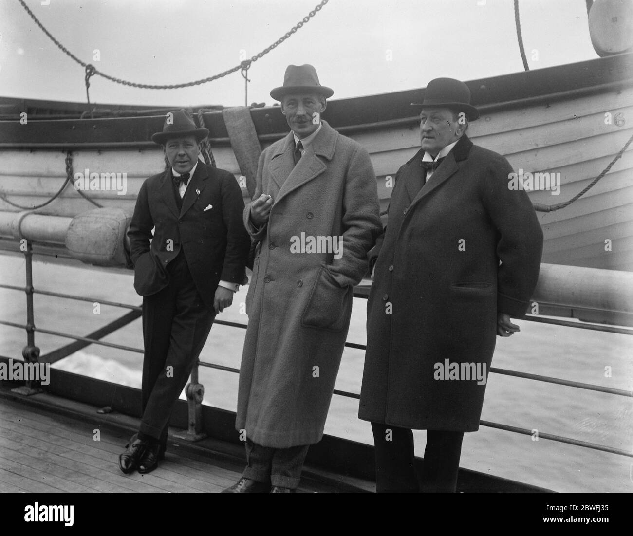 Distinguished sailors Distinguished sailors crossing to Paris Right to left Sir William Orpen , Hon F Guest and Lord Illingworth 8 February 1924 Stock Photo