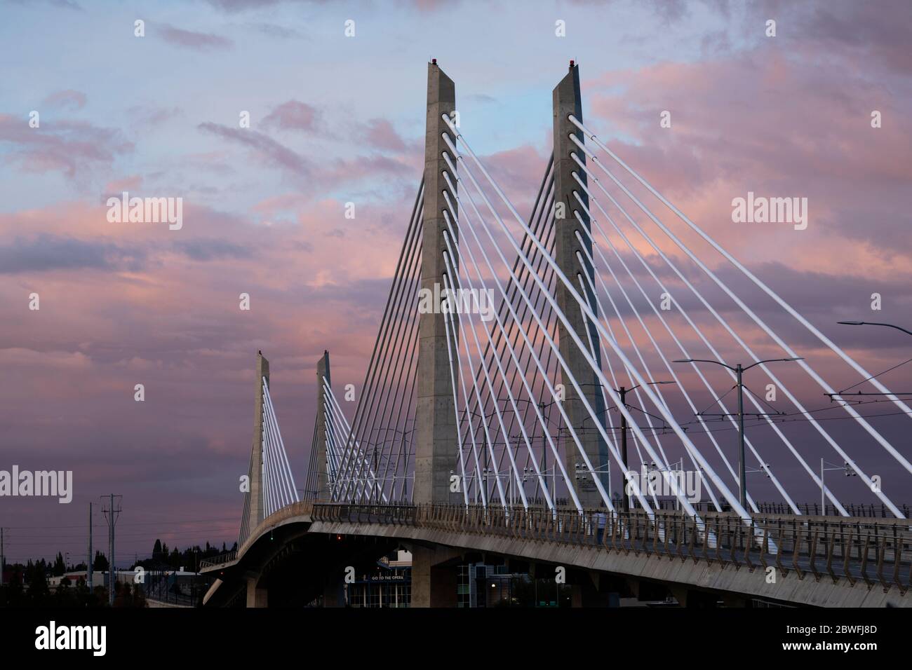 Tilikum Crossing bridge against sky at sunset, Portland, Oregon, USA Stock Photo