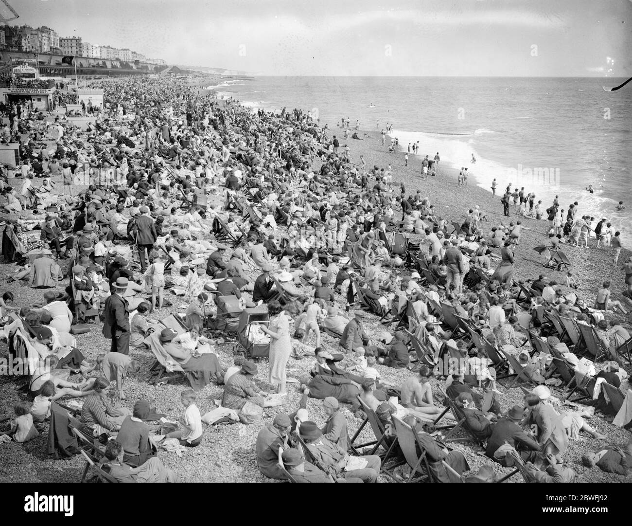 Holidaymakers on Brighton beach . 5th August 1936 Stock Photo