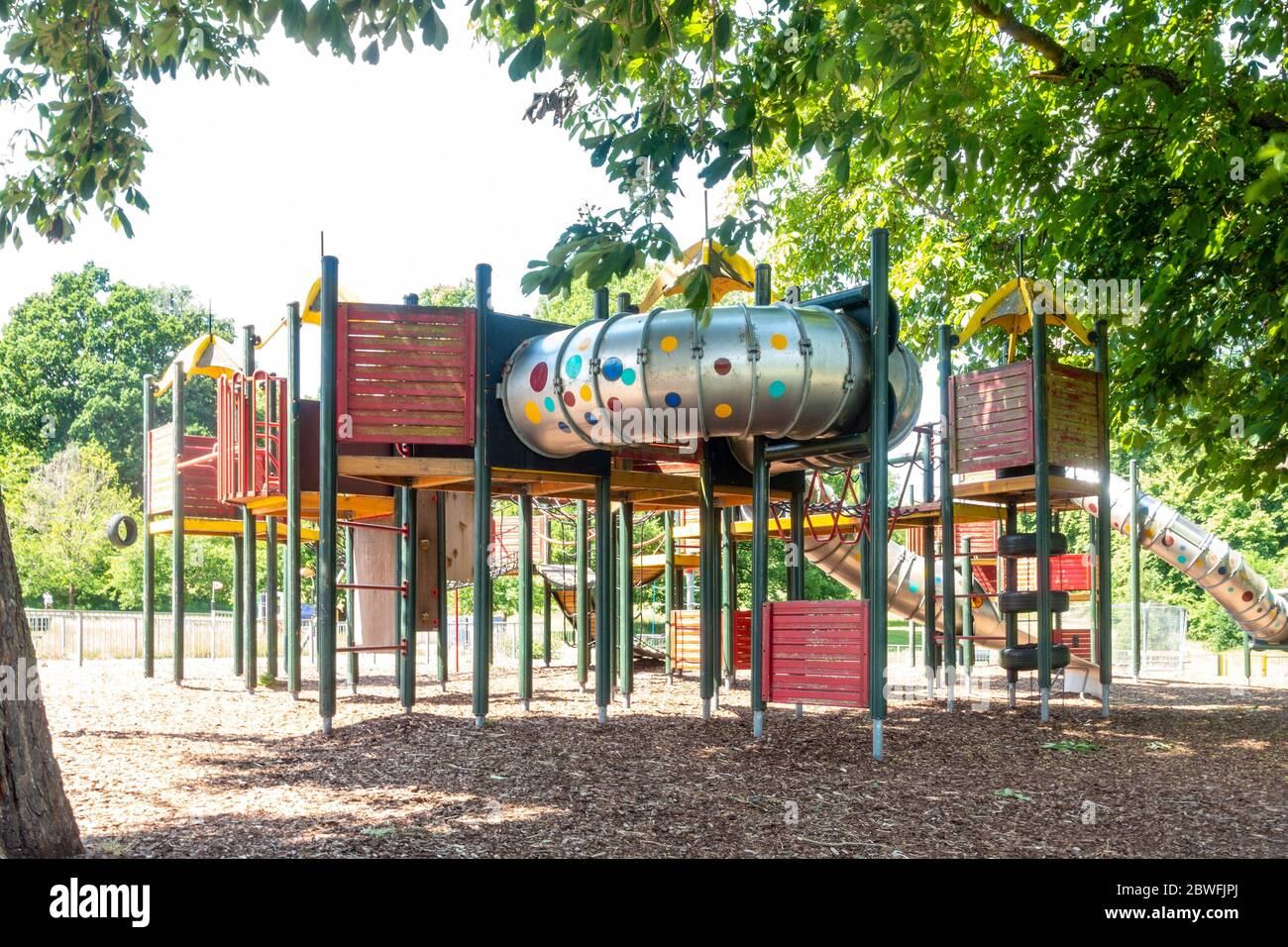 The Children's playground in Prospect Park, Reading is quiet and empty as it is closed due to the Coronavirus pandemic. Stock Photo