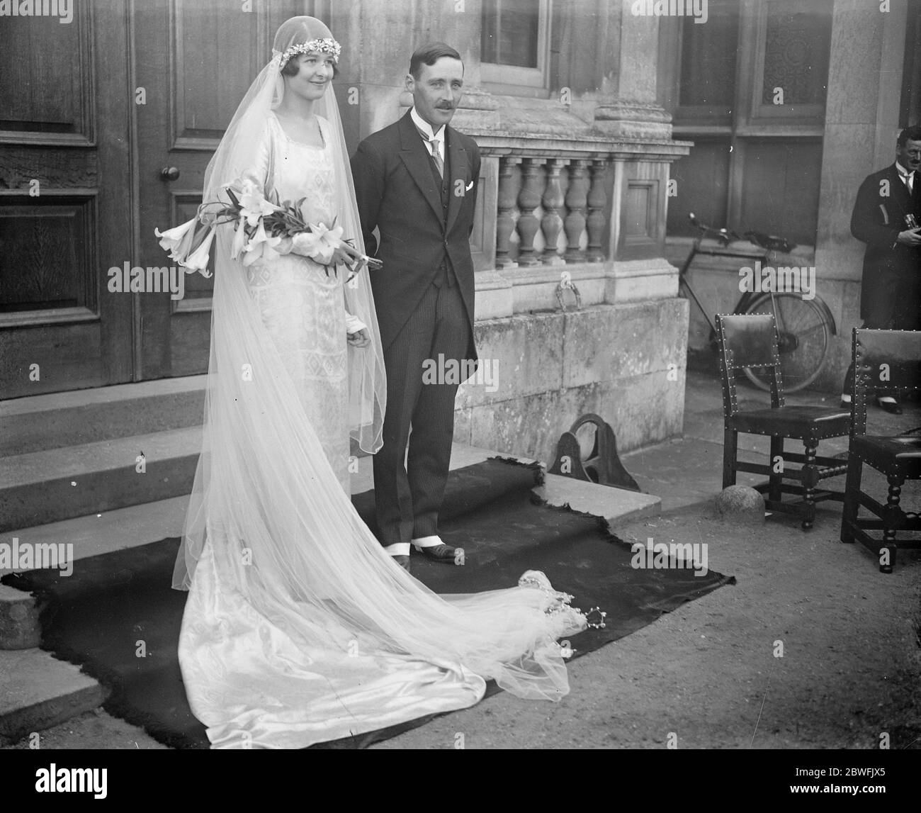 Viscount Folkestone weds . Viscount Folkestone and Miss Helena Adeane were married at Babraham , near Cambridge . The bride and bridegroom . 11 October 1922 Stock Photo