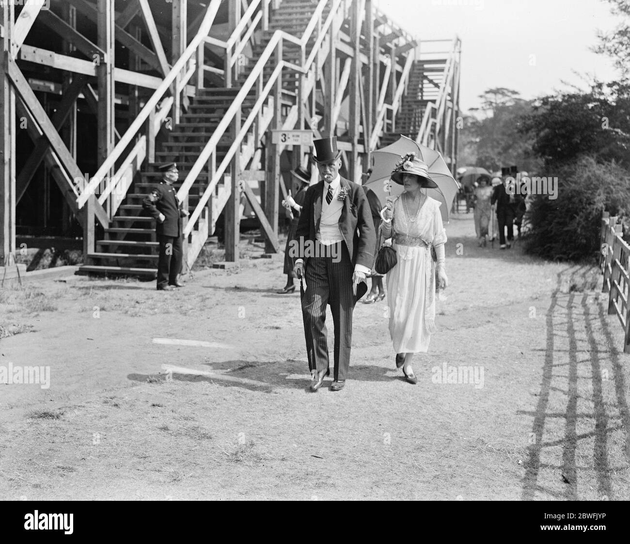 Polo at Hurlingham . The final of the International Tournament between the 2nd Lifeguards and the 17th Lancers . Sir Walter and Lady Gilbey arriving . 9 July 1921 Stock Photo