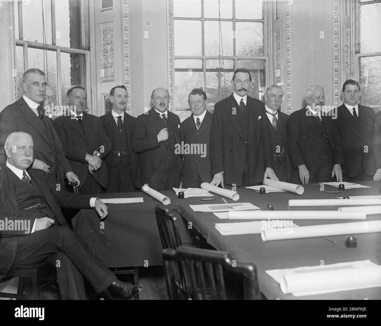 London 's traffic dictators . The Advisory Committee which was appointed to cure London 's traffic chaos held its first meeting at the Ministry of Transport . Colonel Wilfred Ashley , Minister of Transport ( 3rd from right ) , welcoming the delegation . 18 December 1924 Stock Photo