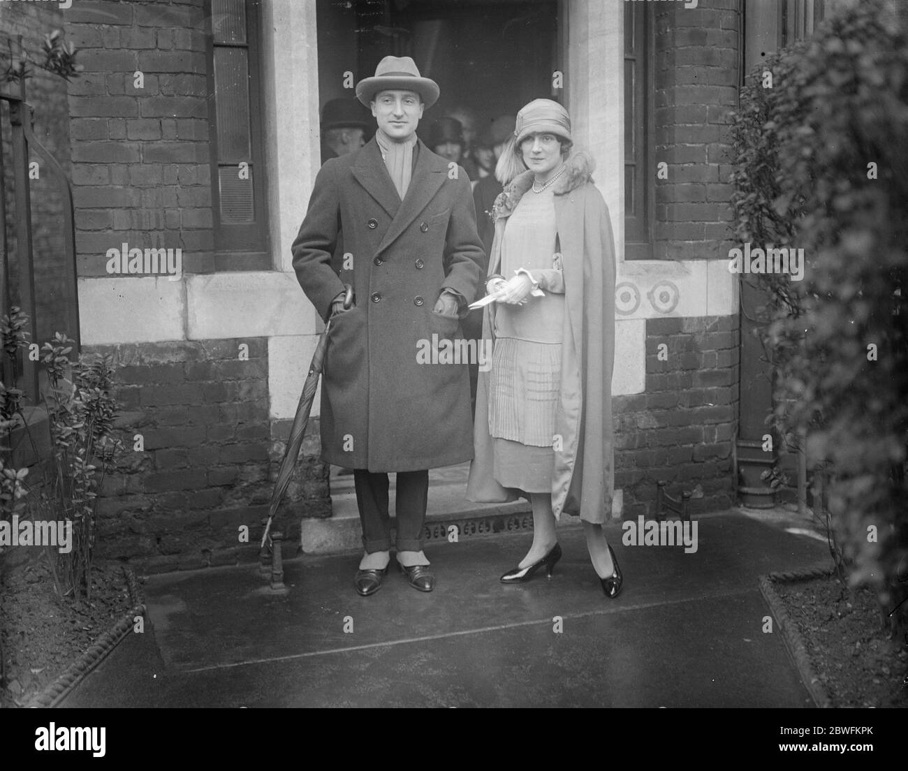 A cabaret romance Mlle Karelina , the Russian dancer of the ' Midnight Follies ' , and Mr Serge Walter leaving Kensington Register Office after their wedding 24 December 1924 Stock Photo
