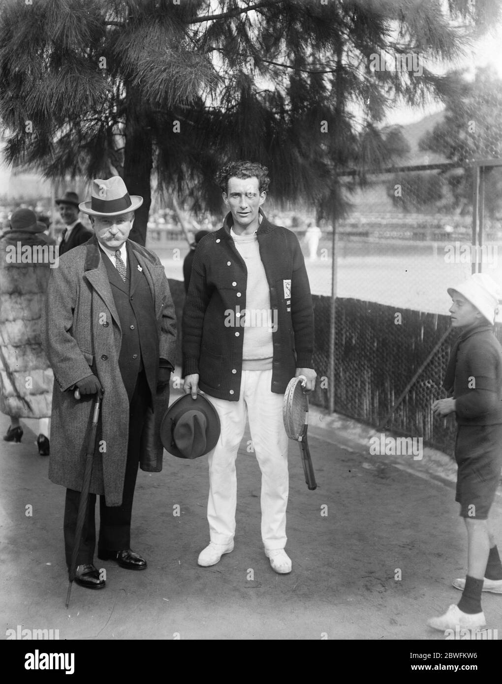 Society on the Riviera Sir Charles Cain with Aeschliman , the Swiss tennis player at Cannes 19 February 1924 Stock Photo