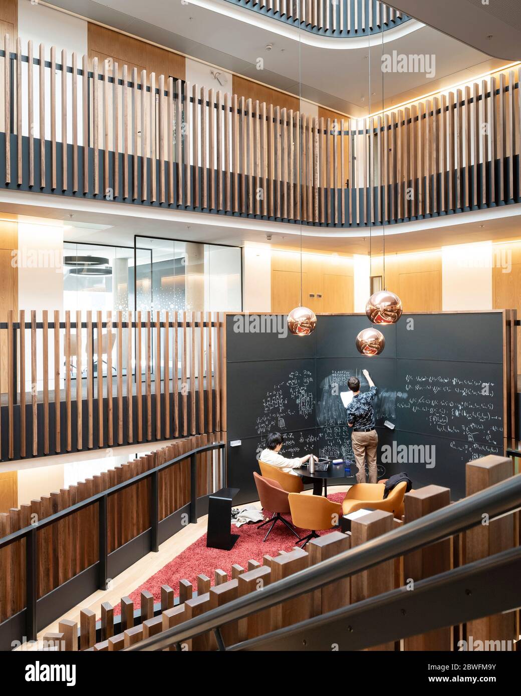 One of the atrium blackboards. Beecroft Building, Oxford, United Kingdom. Architect: Hawkins Brown Architects LLP, 2018. Stock Photo