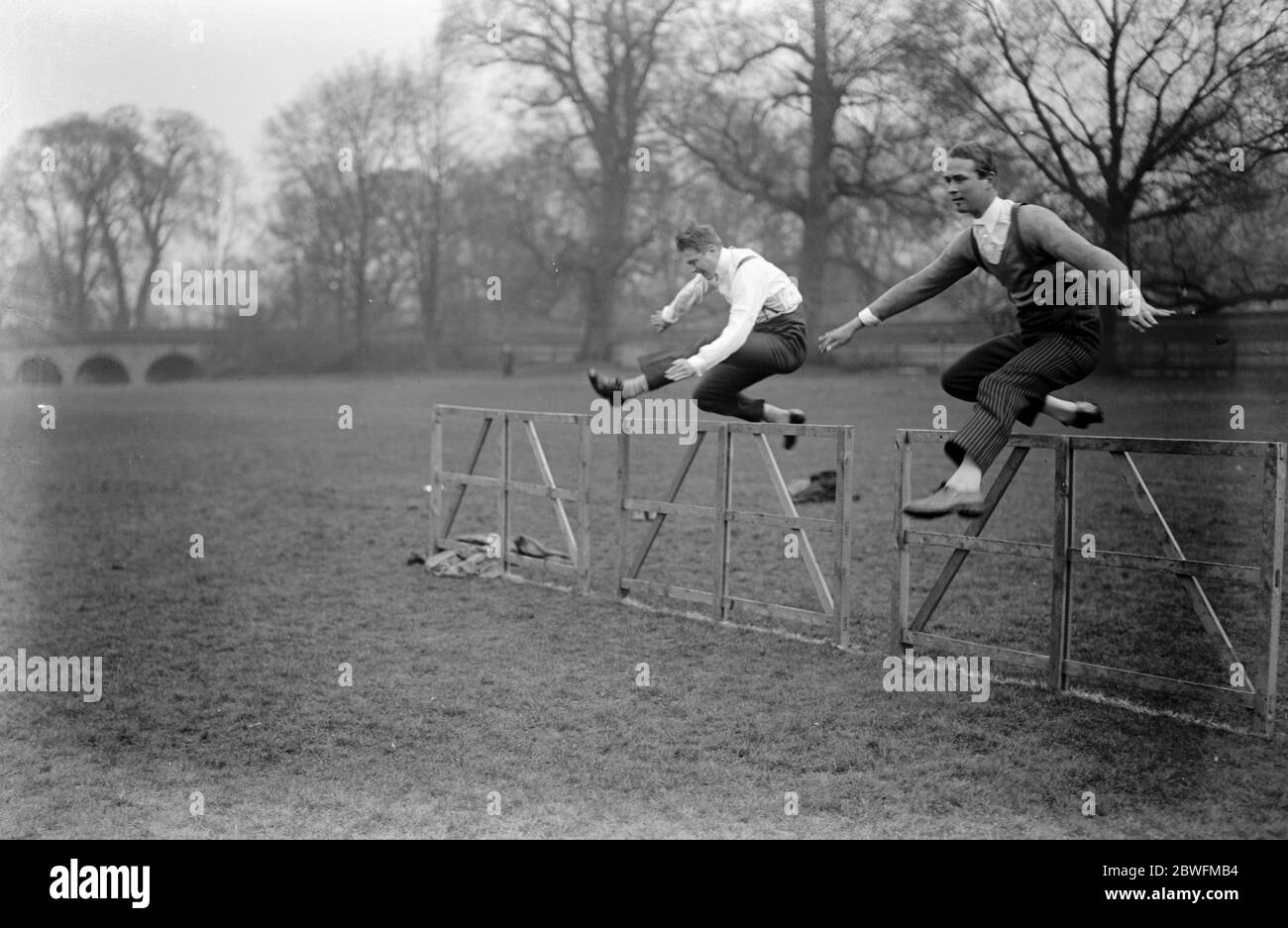 Eton College sports . The Earl of Kincardine ( white shirt ) going over the top against R B Turner in the hurdles at Eton College sports . 16 March 1925 Stock Photo