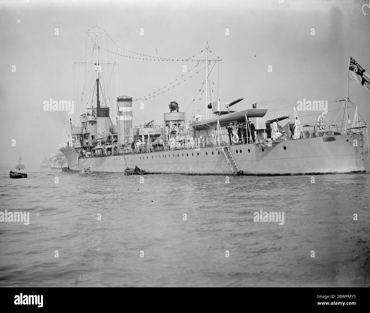 Warships in the Thames . The torpedo boats from the fifth destroyer flotilla arrived off Gravesend on a visit to the Thames . The flagship  Malcolm  of the flotilla on arrival . 8 July 1924 Stock Photo