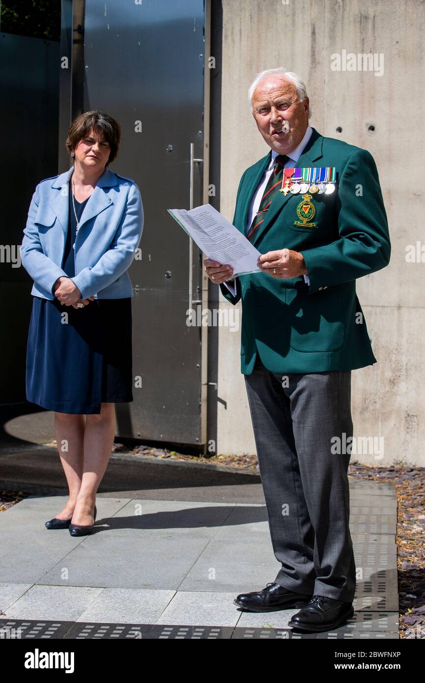 DUP leader Arlene Foster listening to a speech by RUC GC Foundation Chairman Stephen White, at the Royal Ulster Constabulary George Cross Foundation Memorial Garden at PSNI Headquarters on Knock Road in Belfast, to mark 50th anniversary of the RUC Reserve. Stock Photo