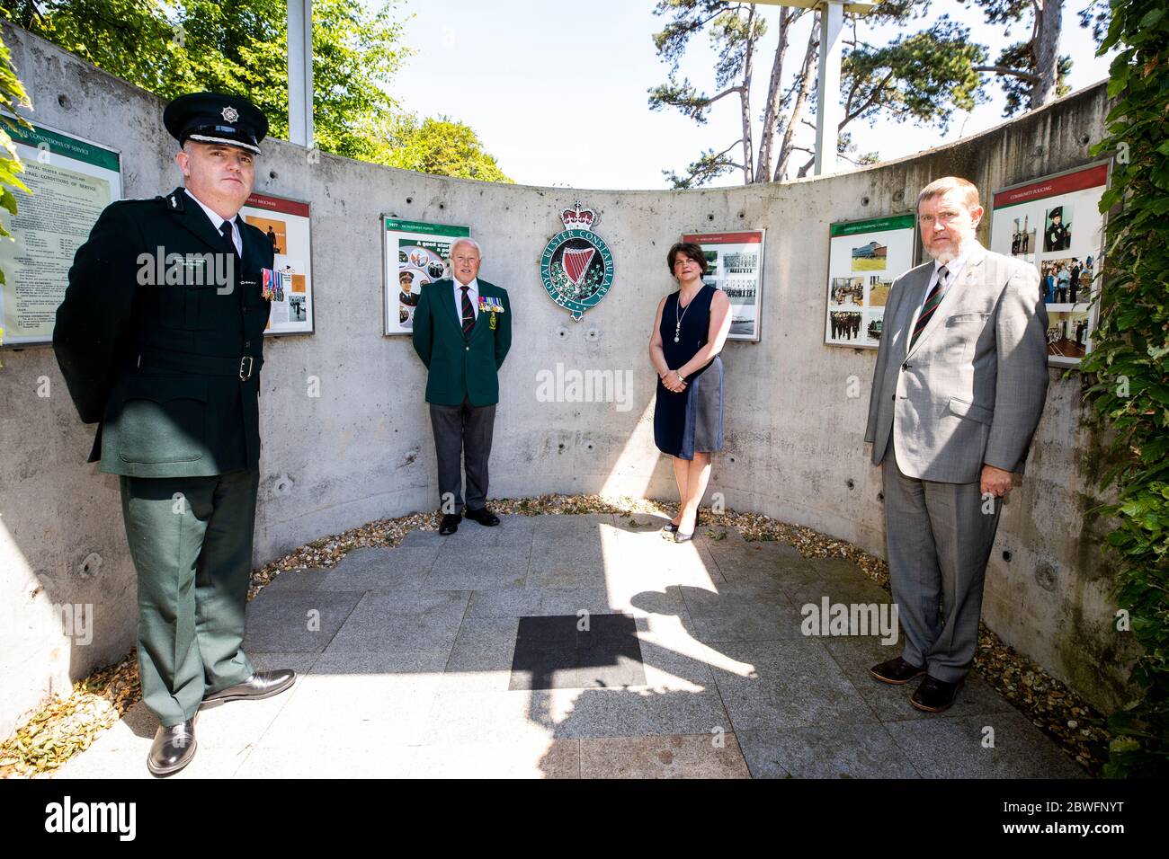 (left to right) Deputy Chief Constable Mark Hamilton, RUC GC Foundation Chairman Stephen White, DUP leader Arlene Foster and DUP MLA and Policing Board member Mervyn Storey, at the Royal Ulster Constabulary Memorial Garden at PSNI Headquarters on Knock Road in Belfast, to mark 50th anniversary of the RUC Reserve. Stock Photo