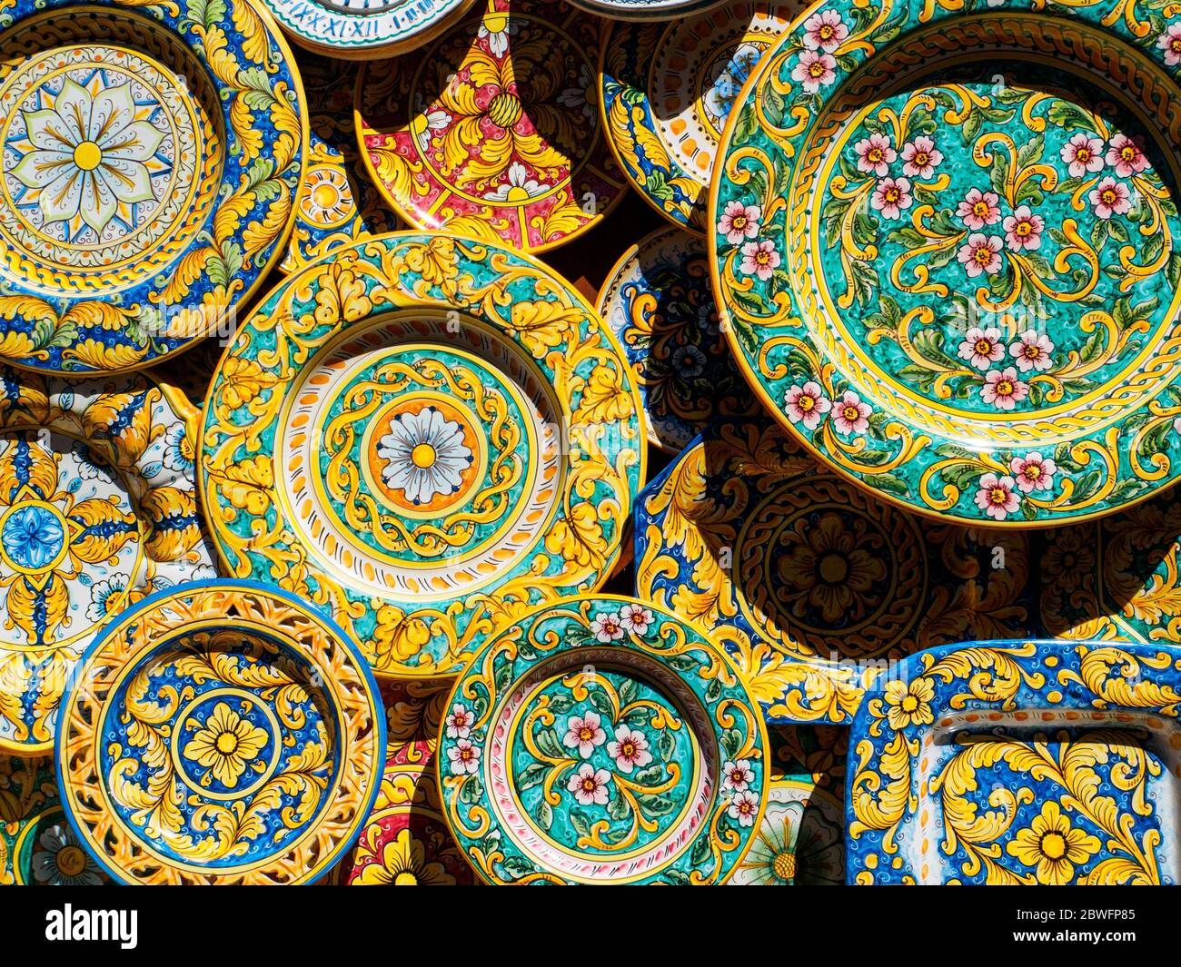 One of the typical artworks of a small town in Sicily, Erice, is the handmade colourful pottery. Stock Photo