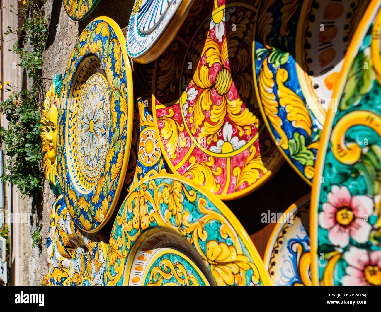 One of the typical artworks of a small town in Sicily, Erice, is the handmade colorful pottery. Stock Photo