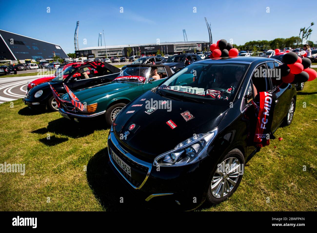 Herning, Denmark. 01st June, 2020. Fans of the Danish league leaders FC  Midtjylland support the team from their cars when the Danish Superliga  match between FC Midtjylland and AC Horsens takes place.