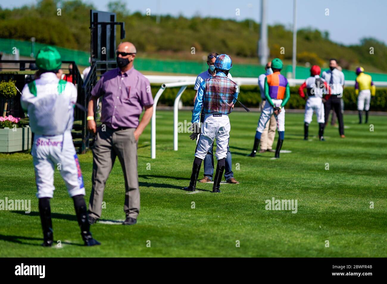 Jockeys observe social distancing at Newcastle Racecourse. Issue date: Monday June 1, 2020. Stock Photo