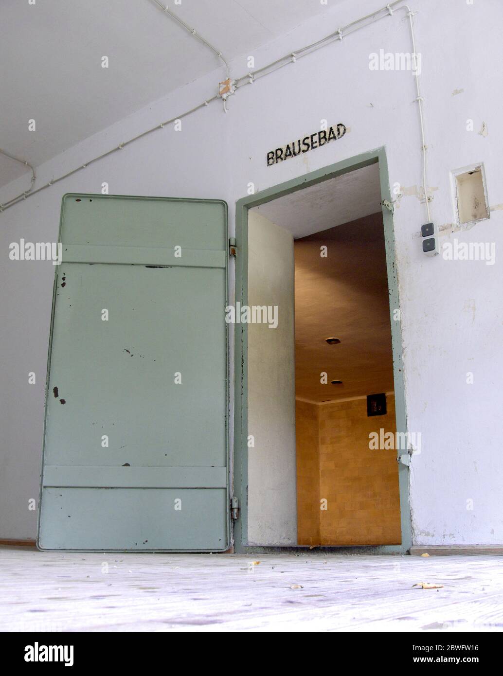 Doorway to Gas Chamber and interior at Dachau Concentration Camp. With ...