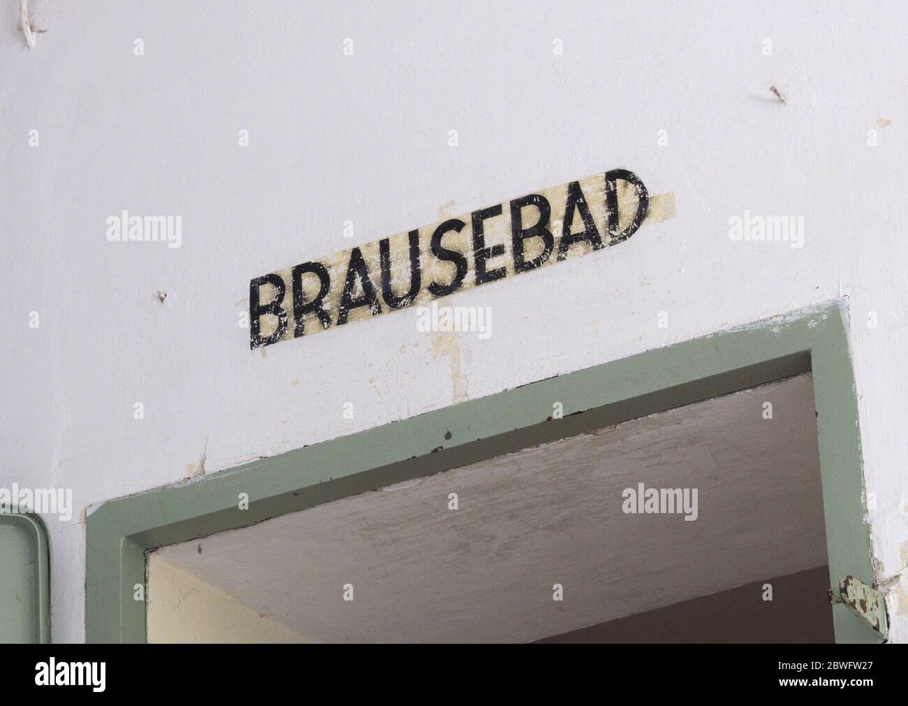 Doorway to Gas Chamber and interior at Dachau Concentration Camp. With ...