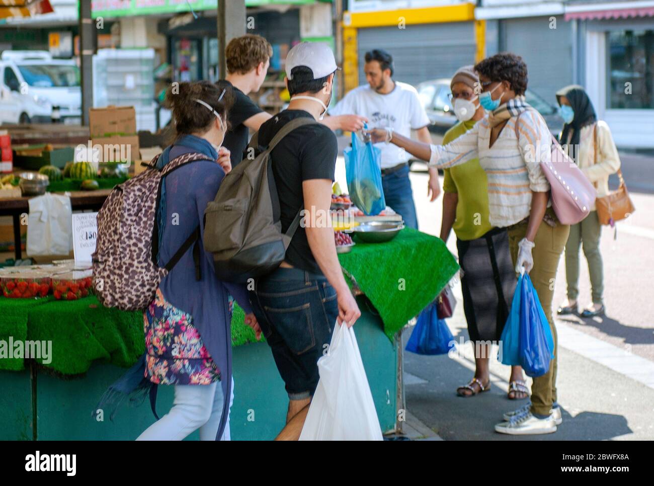 Daily life under coronavirus Covid-19 pandemic lockdown: market traders and stalls re-open Stock Photo