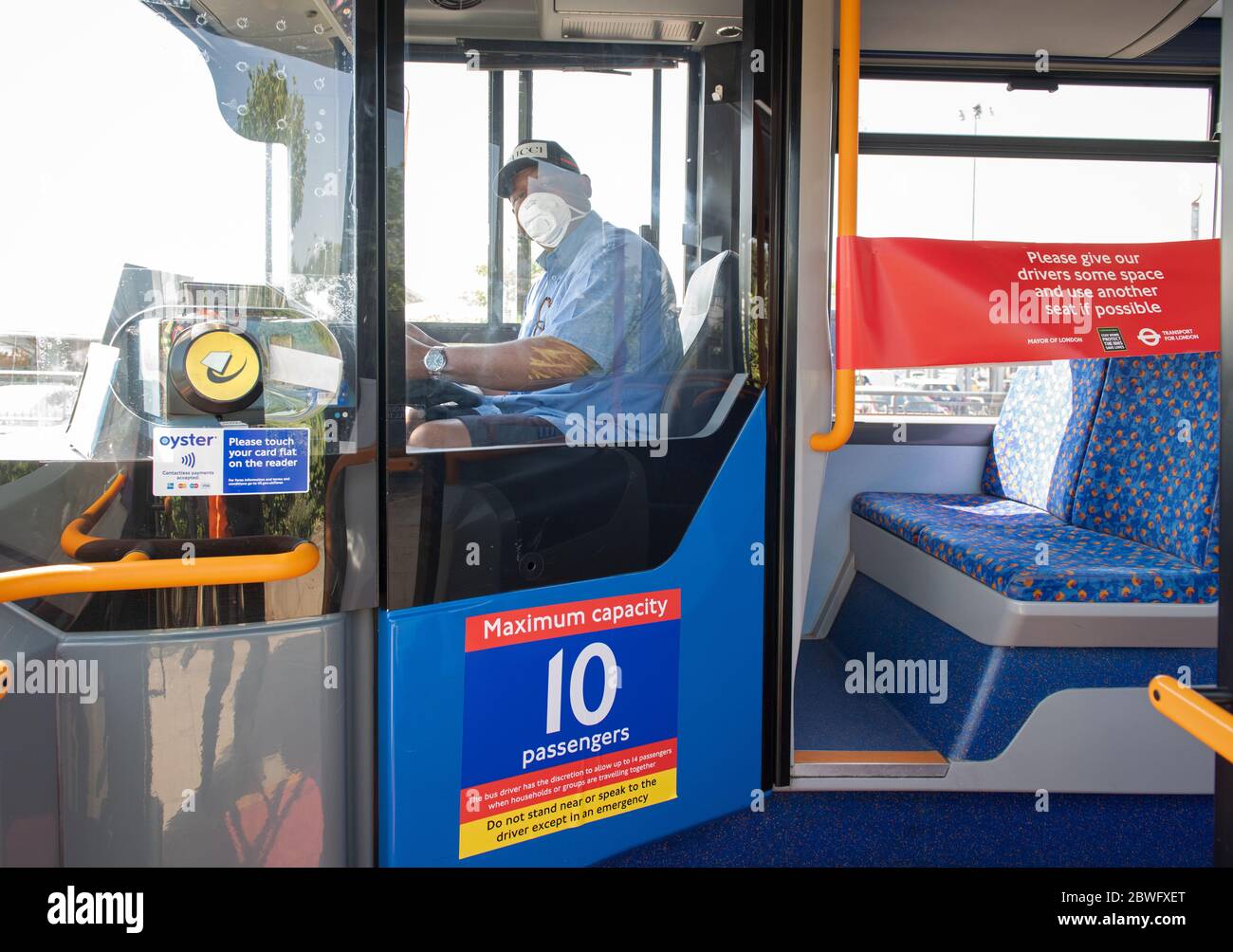 new-stickers-on-buses-remind-commuters-to-socially-distance-during-the