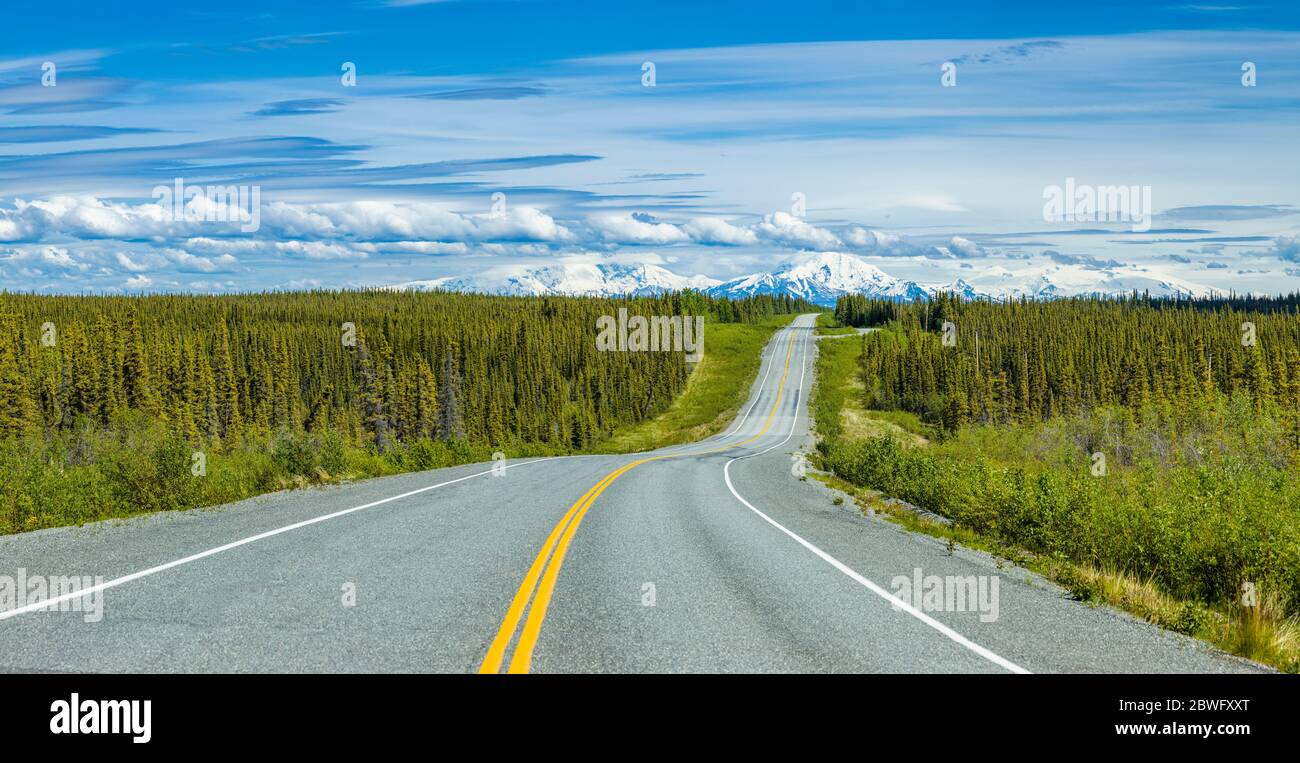 Glenn Highway with Wrangell Mountains in distance, Glennallen, Alaska, USA Stock Photo