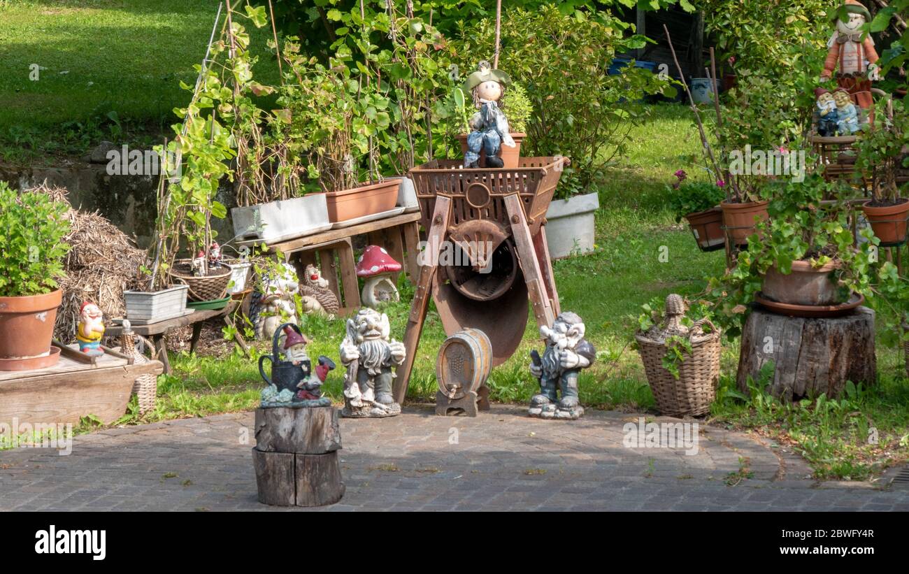 Lots of garden gnomes and knick-knacks Stock Photo