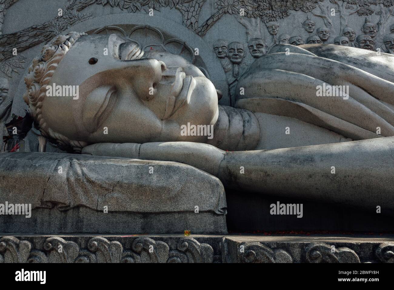 Close view of the reclining Buddha statue at the Long Son Pagoda, Nha Trang, Vietnam Stock Photo
