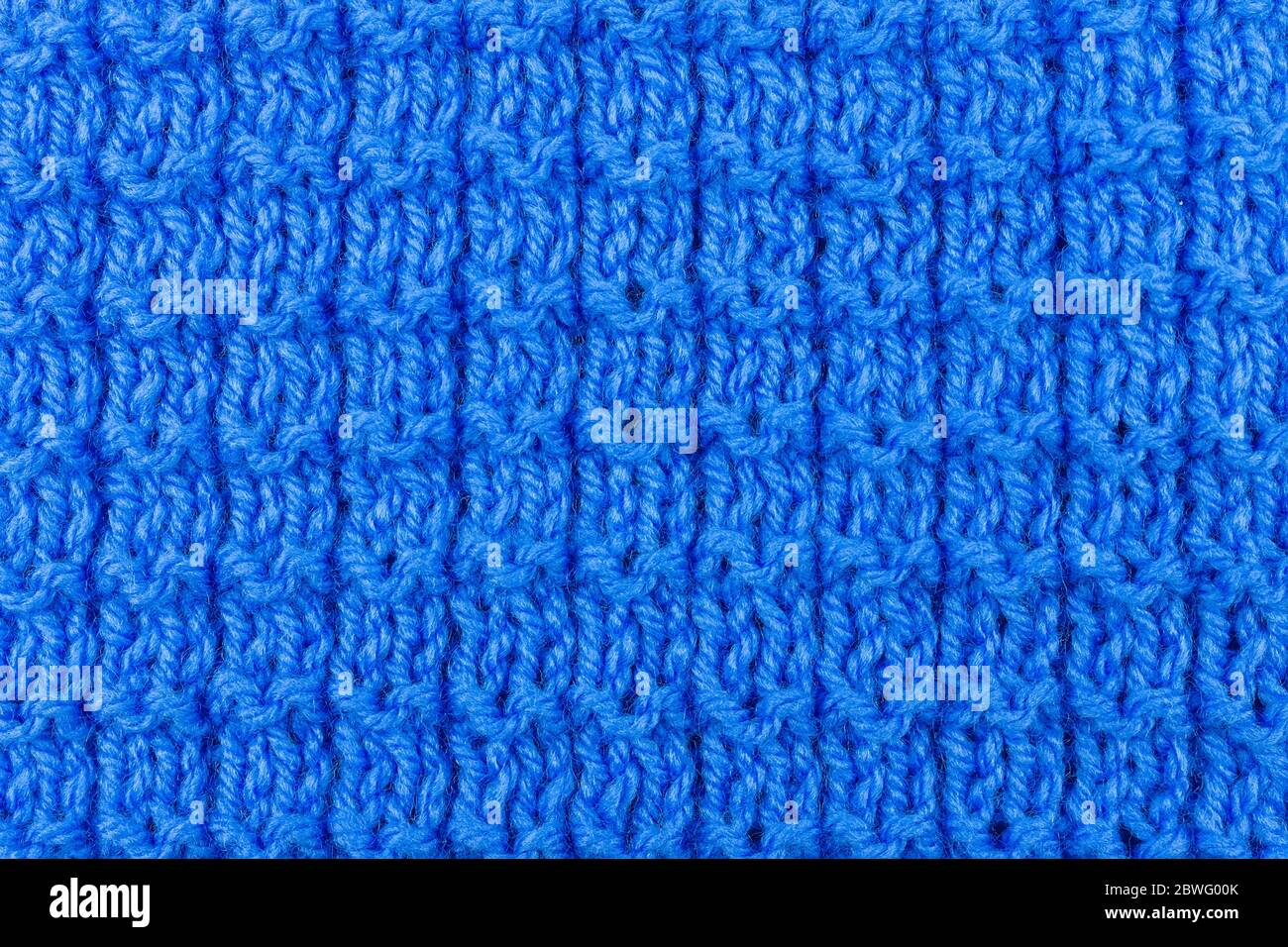 Knitted background. Knitted texture. A sample of knitting from wool ...