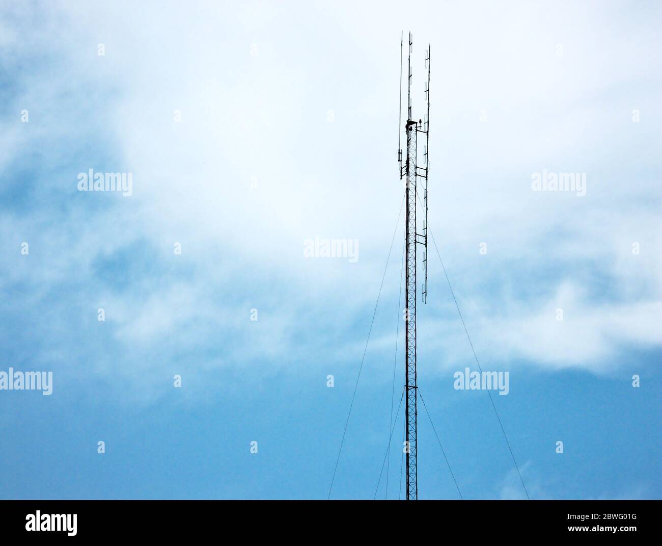 High column radio transmitter on the sky background Stock Photo - Alamy