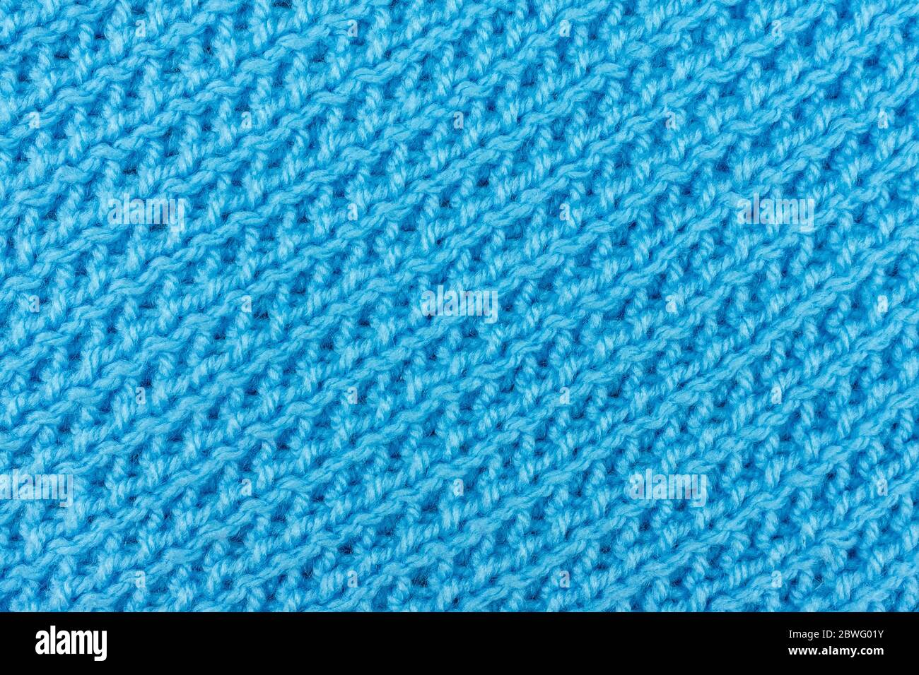 Knitted background. Knitted texture. A sample of knitting from wool ...