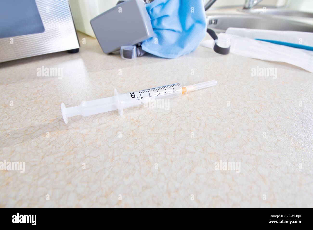 Syringe at the doctor office. Health care concept. Stock Photo