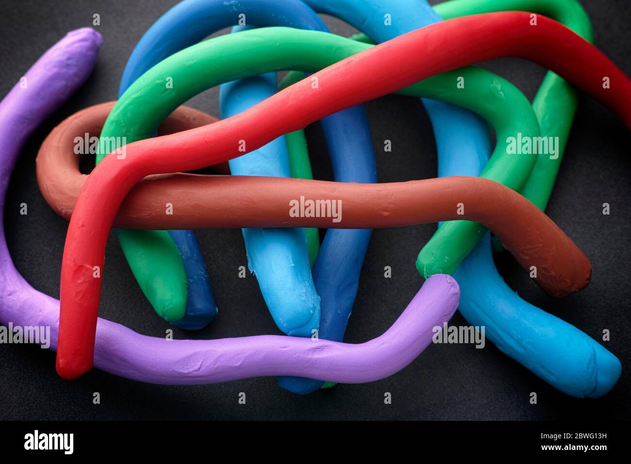 Colorful plasticine lines. Close up. Stock Photo
