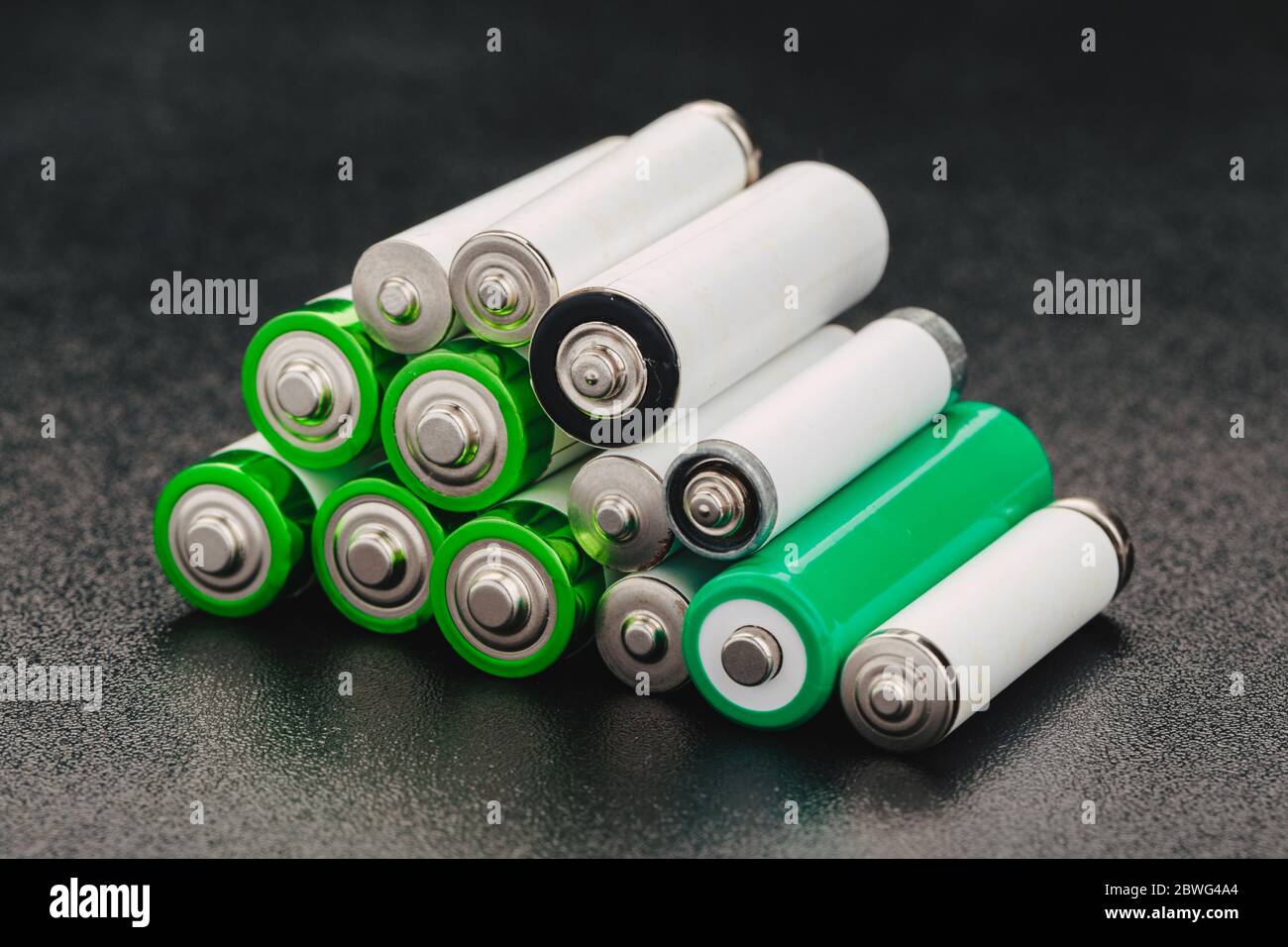 close up of battery positive poles on black backgrounds. intended