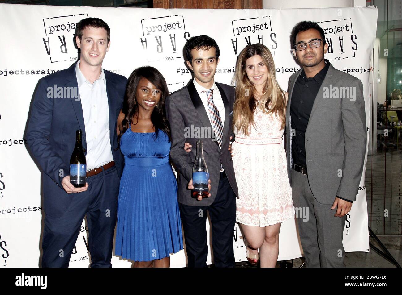 New York, NY, USA. 11 June, 2015. Devin Shoemaker, Founder of Rooftop Reds, the world's first commercially viable urban rooftop vineyard, Co-host of VH1's morning show 'The Gossip Table', Delaina Dixon, Project Sara Inc. Co-Founder, Viraj Borkar, Associate Producer at NBC Universal's Bravo TV, Chanel Omari, Abhishek Khade at the Launch Of Dining Reconstructed: An Off Menu Experience at The Starrett Leigh Building. Credit: Steve Mack/Alamy Stock Photo