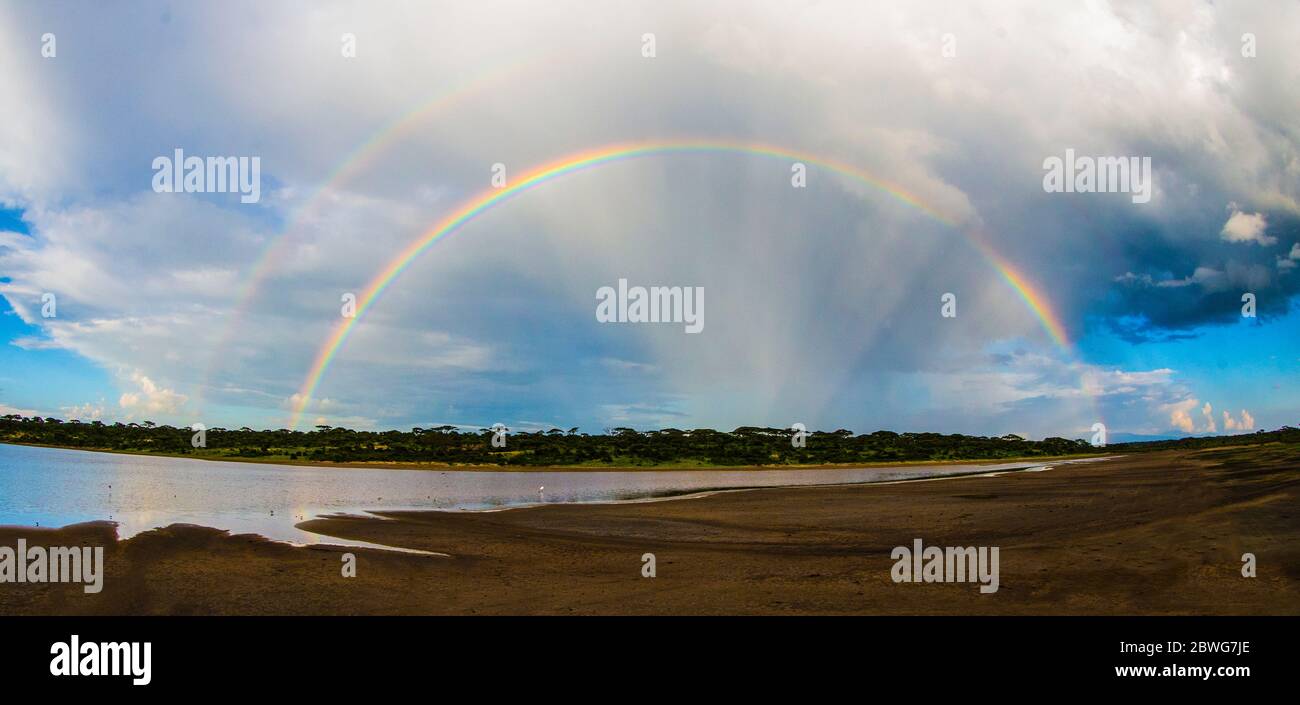 Rainbow over Ngorongoro Conservation Area, Tanzania, Africa Stock Photo