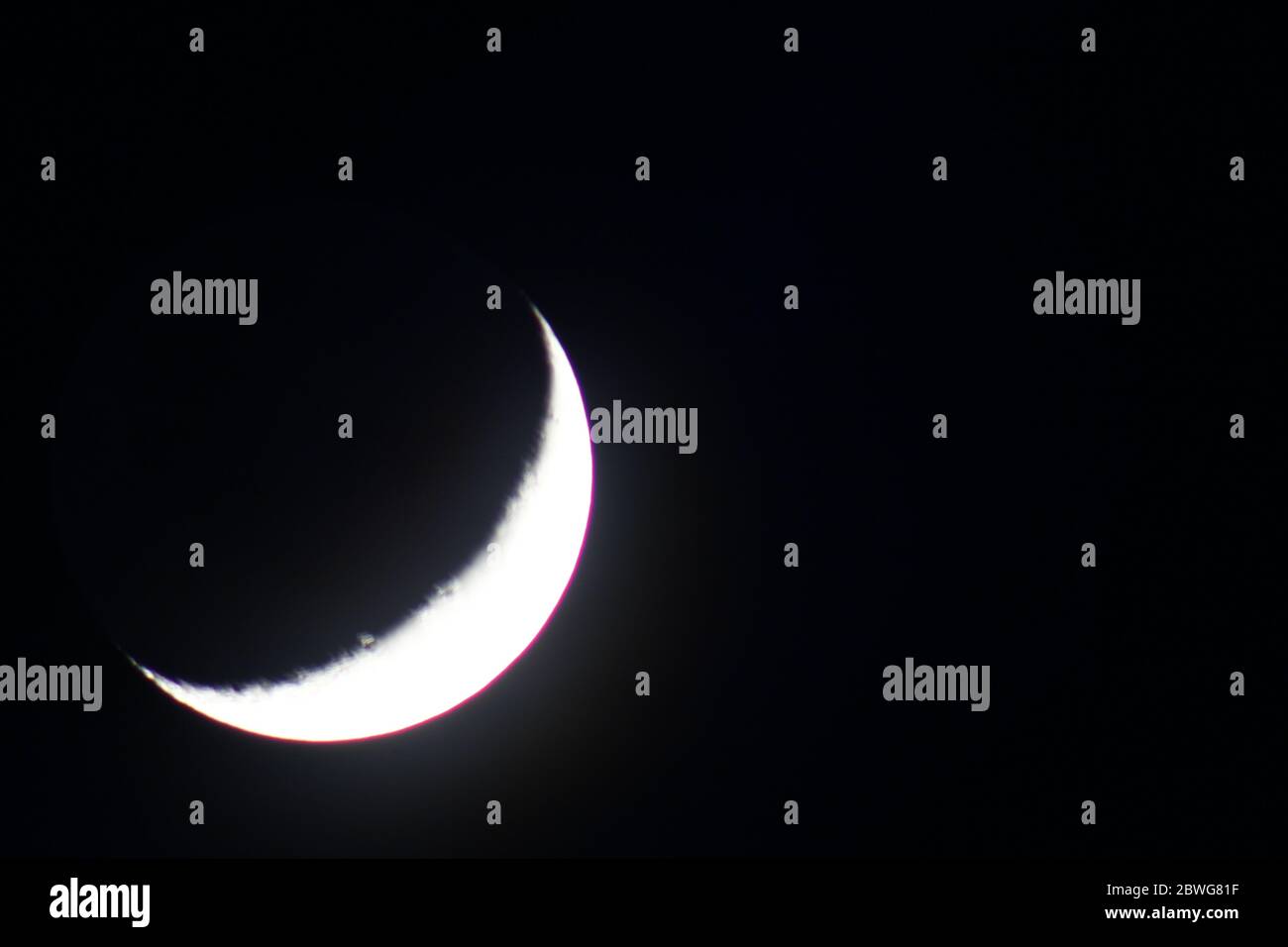 Waxing Crescent Moon Stock Photo Alamy