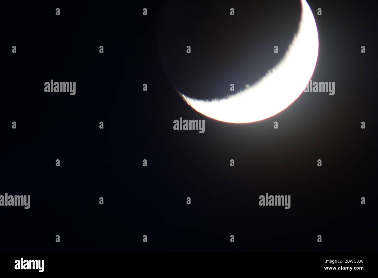 Waxing Crescent Moon Stock Photo Alamy